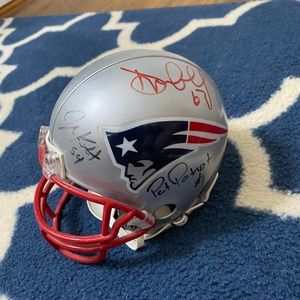 Mini Patriots helmet signed by players